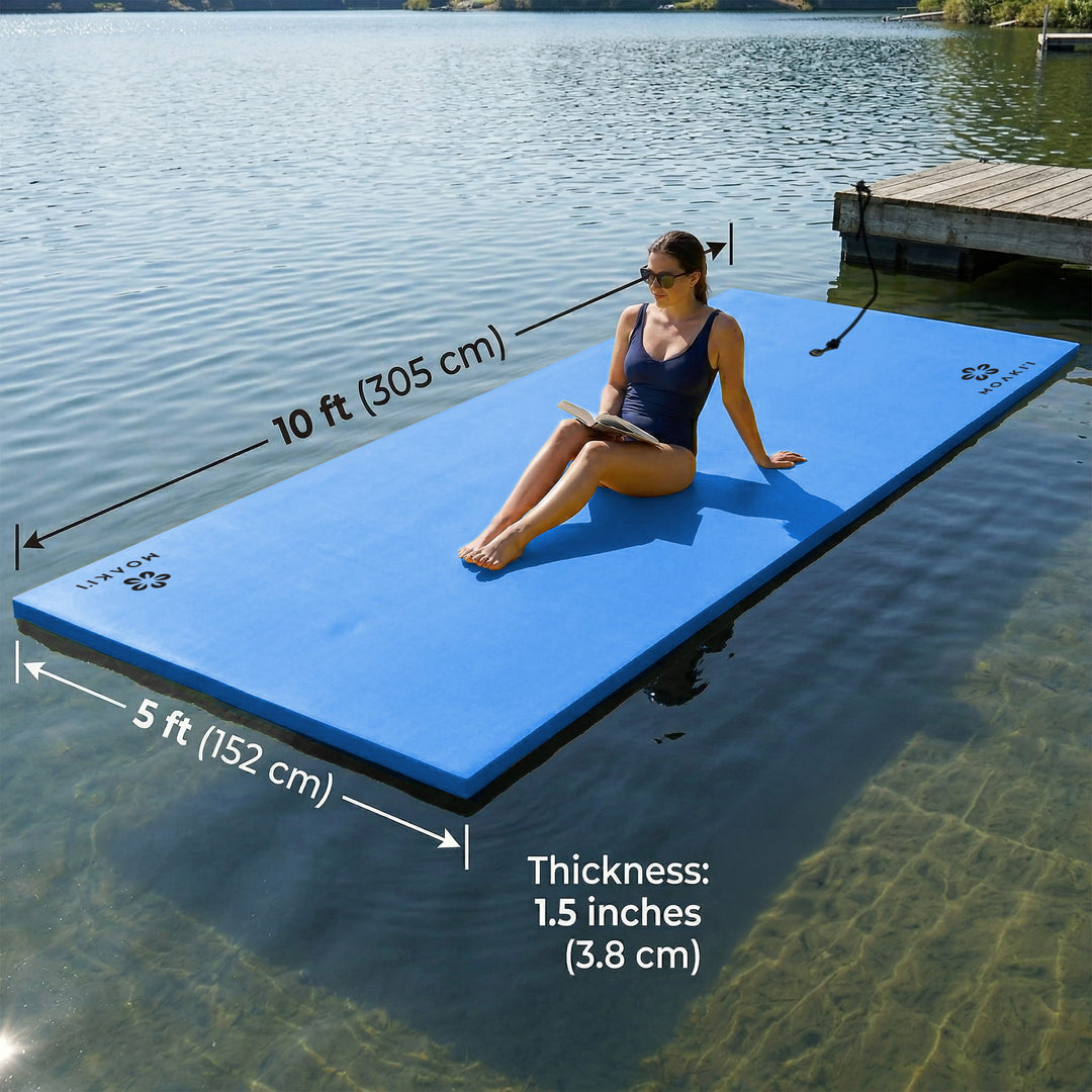 Woman sitting on a blue large floatation device in a lake with measurements indicated.