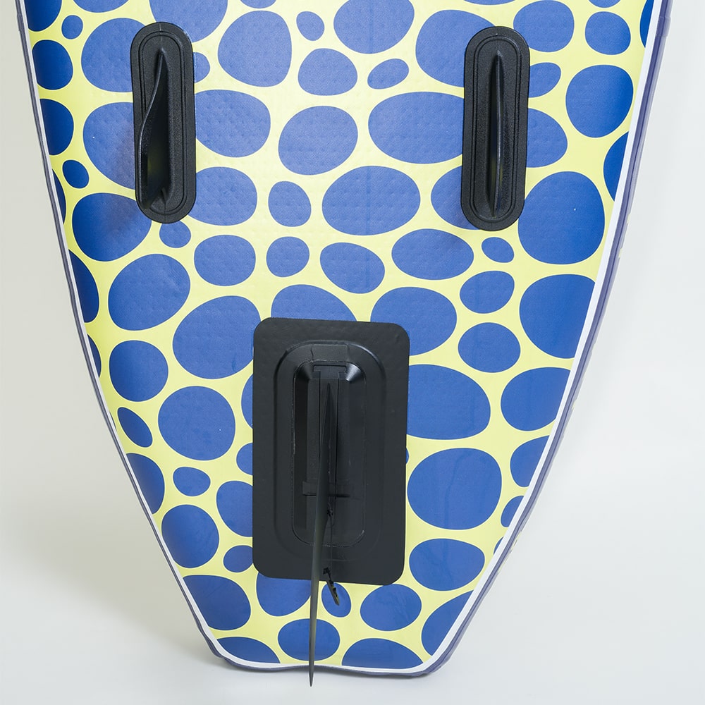 Detailed view of the Trekker's tail featuring the three-fin tracking system and rear leash attachment.