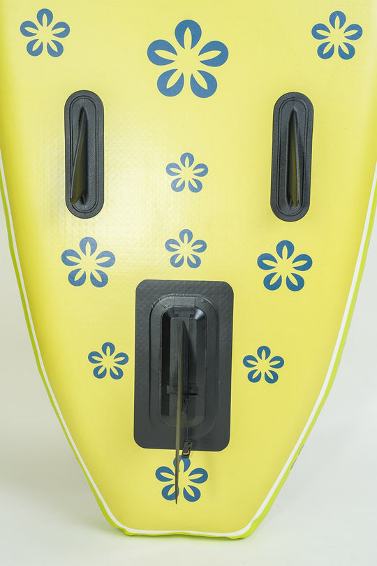 Detailed view of the floral Moaki'i logo on the Trekker's yellow traction pad.