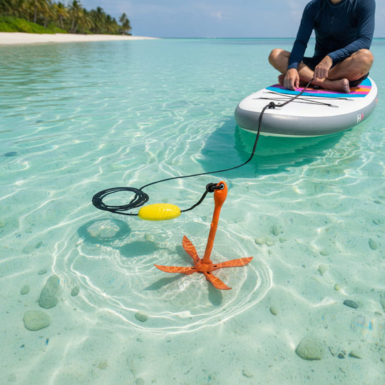 Person on a paddleboard with a remote control device in clear water