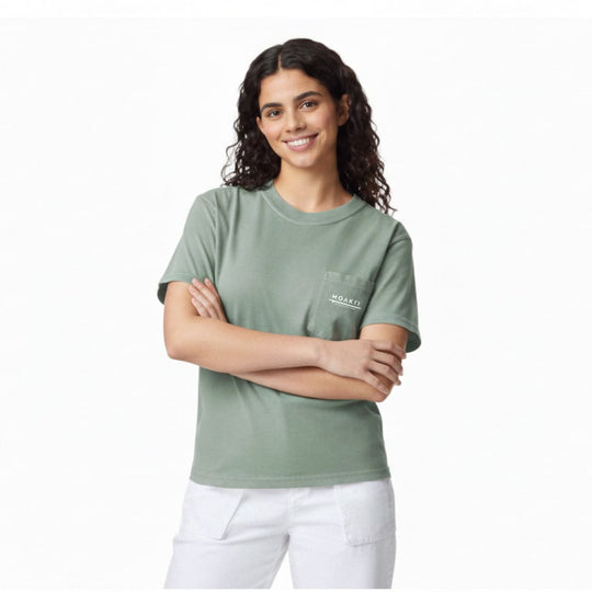 Woman wearing a green t-shirt with a logo on a white background