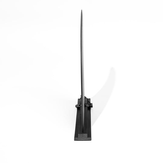 Black replacement fin for paddleboard on a white background