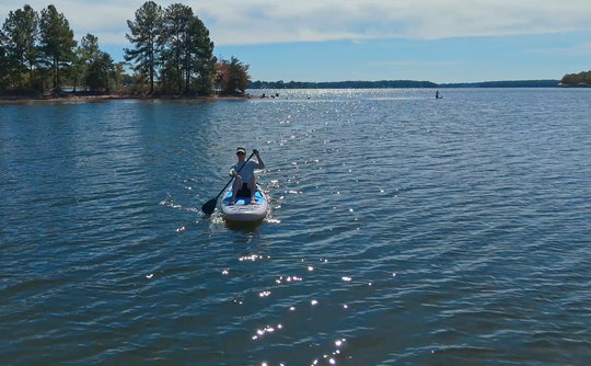 Aerial shot of the Trekker on a lake, highlighting its compact and agile shape.