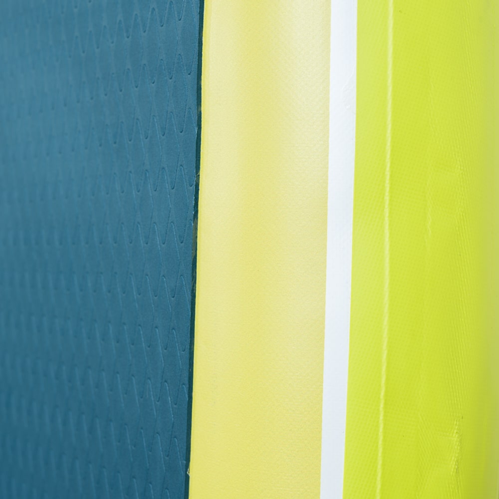 Side profile of the Trekker showing its vibrant color scheme and rail construction