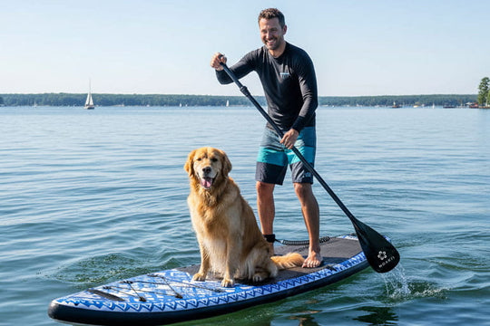 Paddler and dog on the Moaki'i Seeker 11'6", demonstrating its massive 360lb weight capacity and stability.
