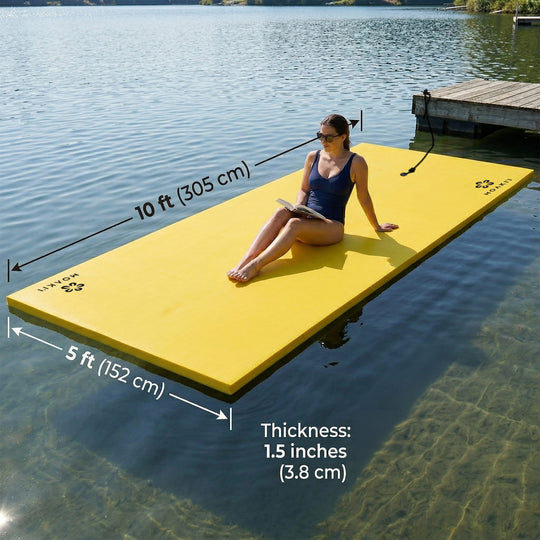 Woman sitting on a yellow water mat with measurements and text overlay on a lake.