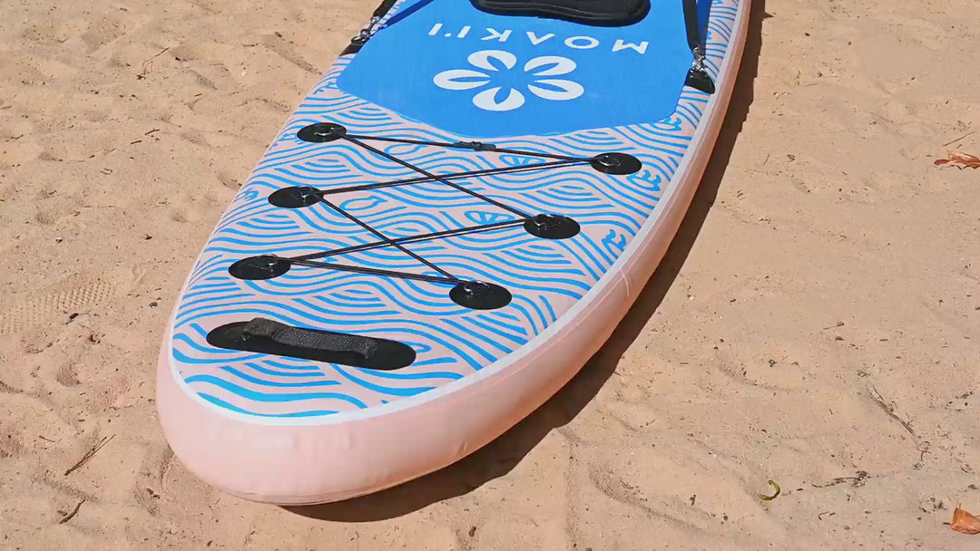 Close-up of the Trekker's blue non-slip EVA traction pad with floral Moaki'i logo.