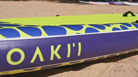 Video showing the Moaki'i signature logo on the side rail of the Trekker paddleboard.